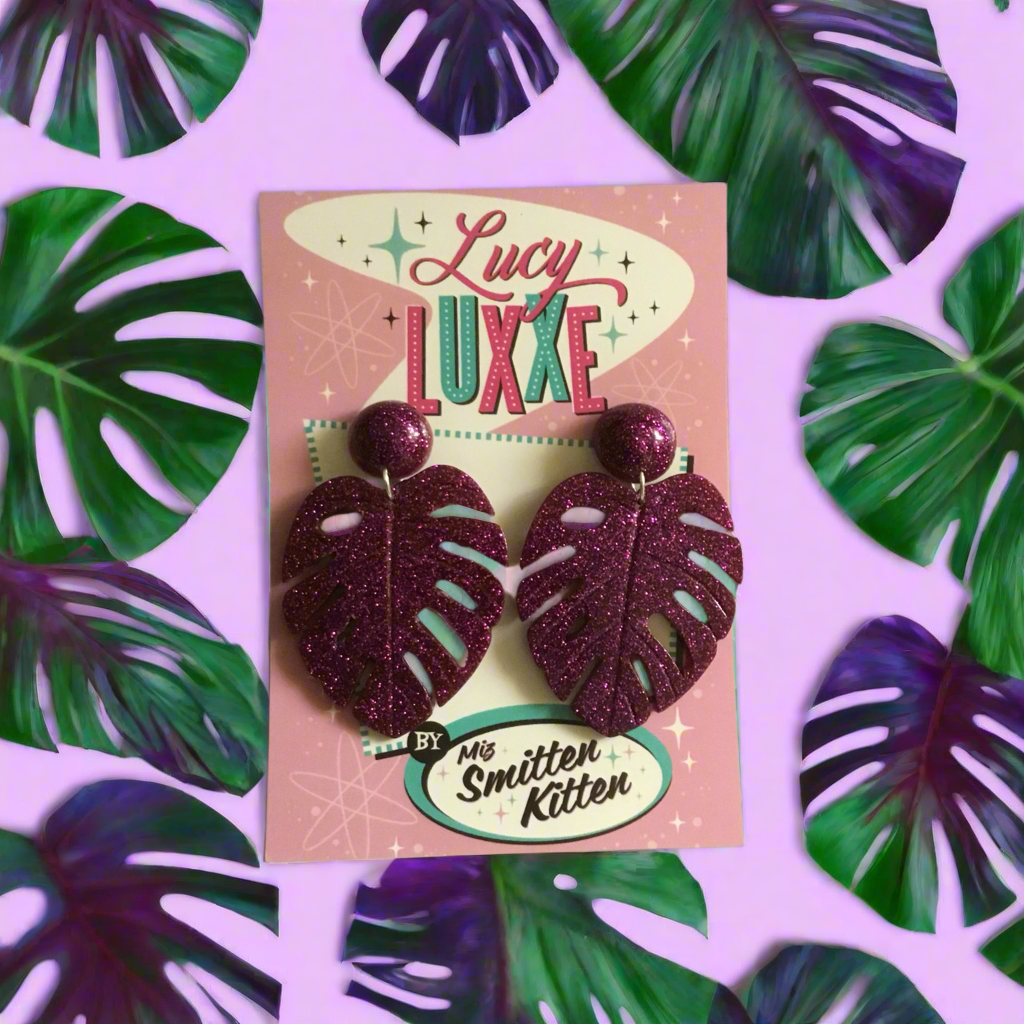 MISS KATE tiki queen - monstera leaf earrings - Purple glitter