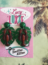 Load image into Gallery viewer, TIKI style -🦞 Lobster and monstera leaf earrings
