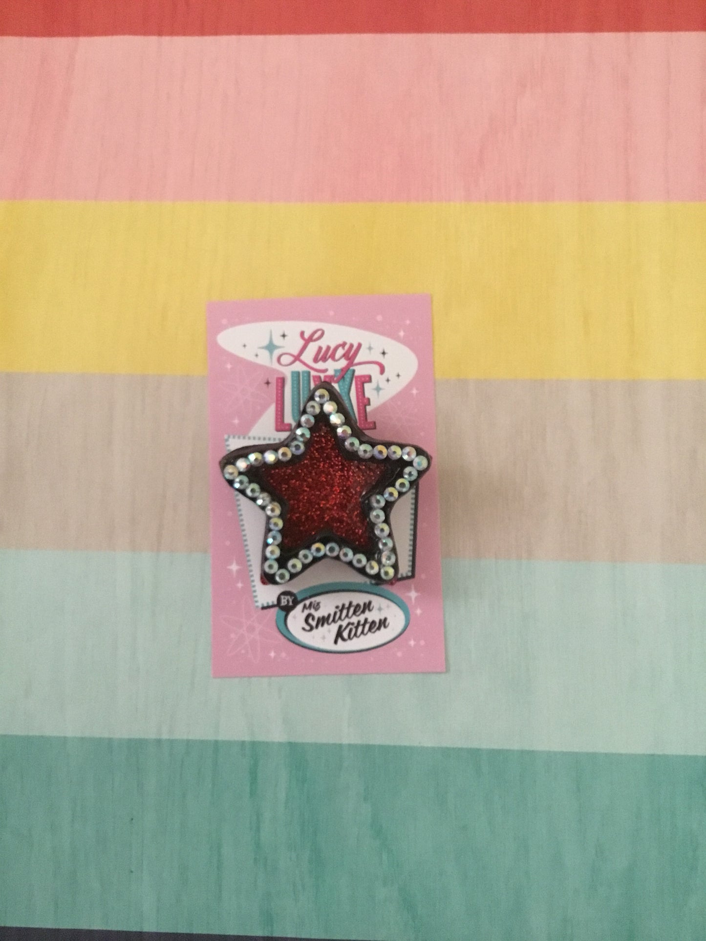 SHOOTING STAR - star brooch - black / red