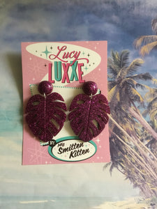 MISS KATE tiki queen - monstera leaf earrings - Purple glitter